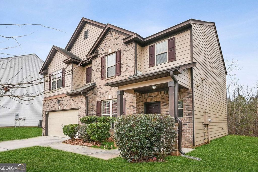 Photo of 5615 Wisbech Way, Atlanta, GA 30349 (MLS # 10758585)