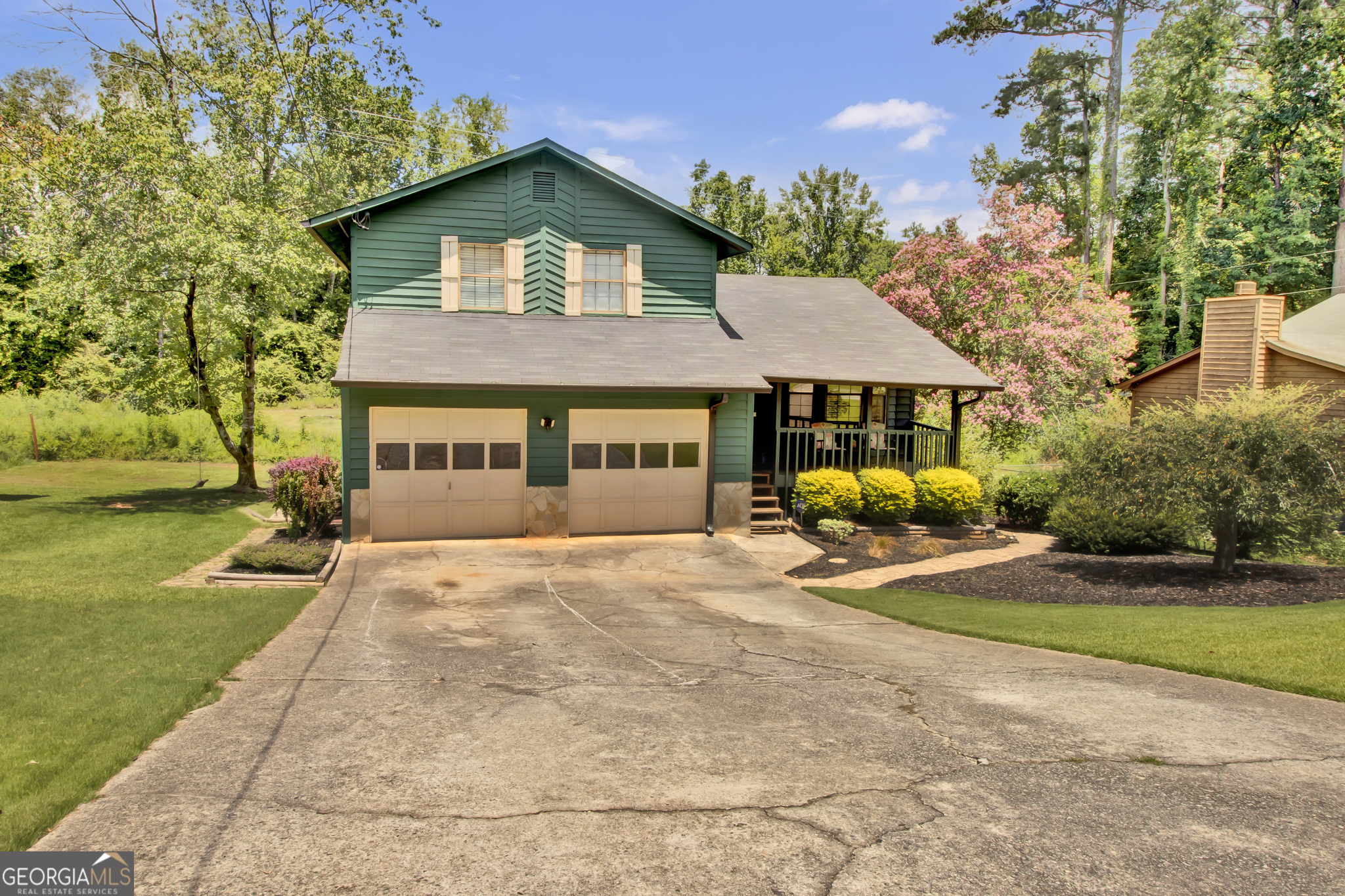 Discover the perfect blend of modern comfort, convenience, and affordability in this beautifully maintained 3-bedroom, 2-bathroom home, offering 1,450 square feet of open-concept living. Tucked away in the tranquil and neighborly Pony Run community, this gem delivers the best of both worlds: peaceful suburban living with quick 10 minute access to the vibrant heart of Downtown Duluth and Old Norcross. Zoned for the top-rated Paul Duke STEM High School, this home is a smart choice for families prioritizing education. With easy access to I-85 and Buford Highway, you're just 20 minutes from Brookhaven, Buckhead, Chamblee, Peachtree Corners, Johns Creek, CDC/Emory University, and the new Arthur M. Blank Children's Hospital. Step inside to a home designed for comfort and style. Enjoy a modern kitchen complete with stone countertops and a sleek tiled backsplash, updated bathrooms, fresh flooring, and carpeting throughout. A cozy fireplace anchors the living area, while a spacious deck and level backyard-which flows into an expansive greenbelt-offers the perfect backdrop for outdoor entertaining or quiet relaxation. Move in with peace of mind: new HVAC system, Gas hot water service and kitchen, fresh interior and exterior paint, and a durable, well-maintained roof ensure a truly turn-key experience. In today's market, finding a home that's more affordable than renting while offering this level of quality and location is rare. This property represents an exceptional opportunity to build equity instead of paying someone else's mortgage, all while living in one of Duluth's most desirable areas. Schedule your private tour today and start your next chapter in this exceptional home.