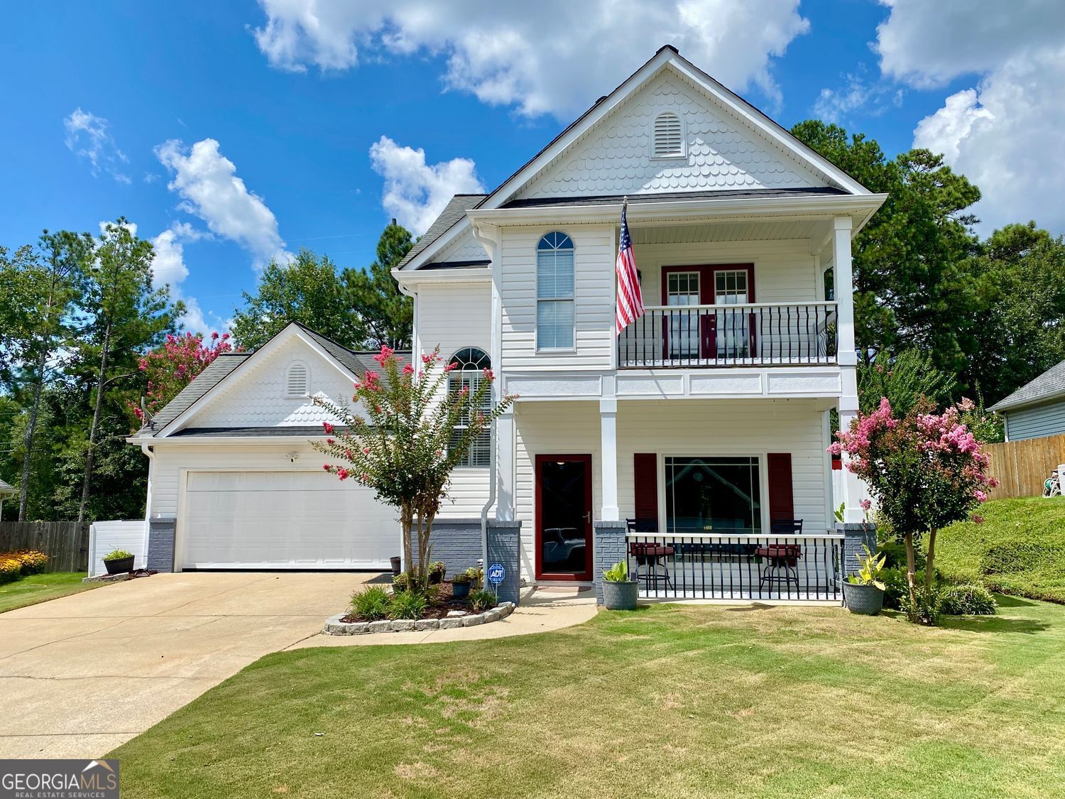 Welcome to 2156 Racoon Court, located in Mirror Lake, a 36 holes of championship golf/ swim/ tennis/ pickleball/ playground/ lake with fishing & kayaking- sailing- canoeing on 96 acre Mirror Lake/ park & walking distance to Publix neighborhood that is just 3 minutes to I-20 & 5 minutes to everything Villa Rica! This home is in great shape with enhanced or new features throughout including flooring/ painting/ granite countertops & stainless steel appliances in the kitchen/ upgraded baths/ storm doors and perhaps as good as all of these items the landscaping might be the best feature! Sodded front and back yard, with a privacy fenced back yard that offers a covered back porch/ a deck/ a firepit area/ a golf chipping & putting area in an very private setting* Newer zoned heat and air/ water heater/ toilets along with carpeting & Luxury Vinyl Planking Flooring* With several community pools, and outstanding location that is so convenient to everything, you cannot go wrong with this great home* It is truly in move in condition* You can also walk to Pine Mountain City Park where you can mine for gold or ride the miniature train*The Greatroom offers a cozy fireplace for those cool winter evenings* The 2 car garage is a spiffy* There is a Home Office (which could be used as a Dining Room if desired)* The Eat In Kitchen brings plenty of space to whip up a great meal for your guests* Upstairs the Primary Bedroom is elegant with a balcony overlooking the culdesac* The new tiled shower and jetted tub brings it all home for you* Oh yeah, there are 2 more Bedrooms and a 2nd Full Bath plus a guest half bath on the main level* Come take a look as soon as you can, you will Love this home!