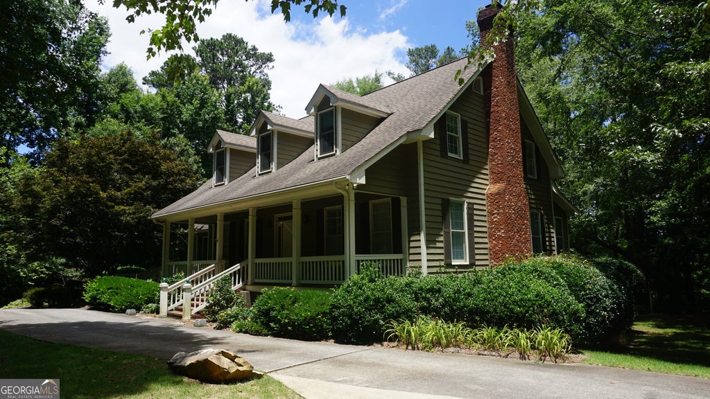 Photo of 8163 Dearing Street, Covington, GA 30014 (MLS # 10792478)