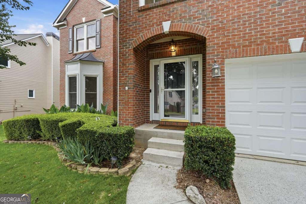 Photo of 160 Treadstone Overlook, Johns Creek, GA 30024 (MLS # 10779205)