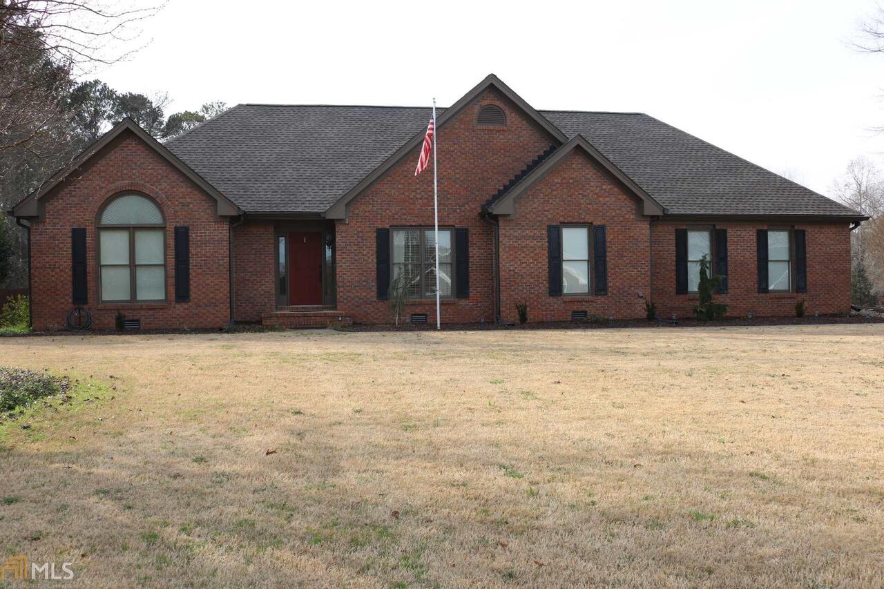 Full brick with split bedroom plan, gameday porch & brick 2-car detached garage in highly sought after Union Grove School District, NO HOA! No detail was overlooked in this immaculate home, from the updates on the interior to the landscaping and relaxing retreat outside! Spacious kitchen with solid surface counters, island, built in oven with microwave, and large open breakfast area with new Low E windows that offers double crank out panels connecting the breakfast area with the screen porch. Separate dining room with natural light illuminating the Acacia hardwood floors perfect for hosting family and friends! Owner's king-sized suite features a tastefully redone ensuite bath. This home boasts 2 additional generous sized bedrooms and a full hall bath. Enjoy your four-season sunroom flex space for whatever your heart desires! Updated farm-style laundry room which features a farm sink and true brick flooring! The covered screened porch is the perfect place to entertain or watch the big game on the TV; be sure not to miss the insulated 100 year old barnwood ceiling that is sure to wow even the pickiest buyer! Step out onto the large deck where you can relax in the hot tub, warm up by the fireplace, or just take in the view of the beautifully landscaped private yard including shade trees, blackberry vines and much more! The 2-car detached garage, surely to win over the car enthusiast or handyman. This garage is finished and heated with a finished bonus room upstairs that is perfect for teenagers, a man cave game room or guest. An attached storage shed has electricity, lights and an awesome barn door! If this isn't enough to convince you, how about the NEW roof replaced in 2021, wood double-hung windows replaced in 2017, two water heaters, or wireless alarm system? BY APPOINTMENT ONLY **SCHEDULE THROUGH SHOWING TIME ONLY**