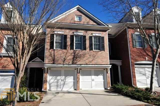 Beautiful brick townhome has been meticulously maintained and is in excellent move-in condition. Recent designer colors throughout, site laid hardwood floors, great room w/fireplace, granite kitchen w/ SS appliances. Large master suite, his/hers closets, bath with jetted tub. Large secondary bedrooms, 3rd floor bedroom/media room has full bath. Large brick enclosed patio is your own secret garden. Gated community w/2 car garage. Wonderful community, pool, tennis, gym, nature trail, walk to Alpharetta city center and new Avalon development. EZ 400 access.