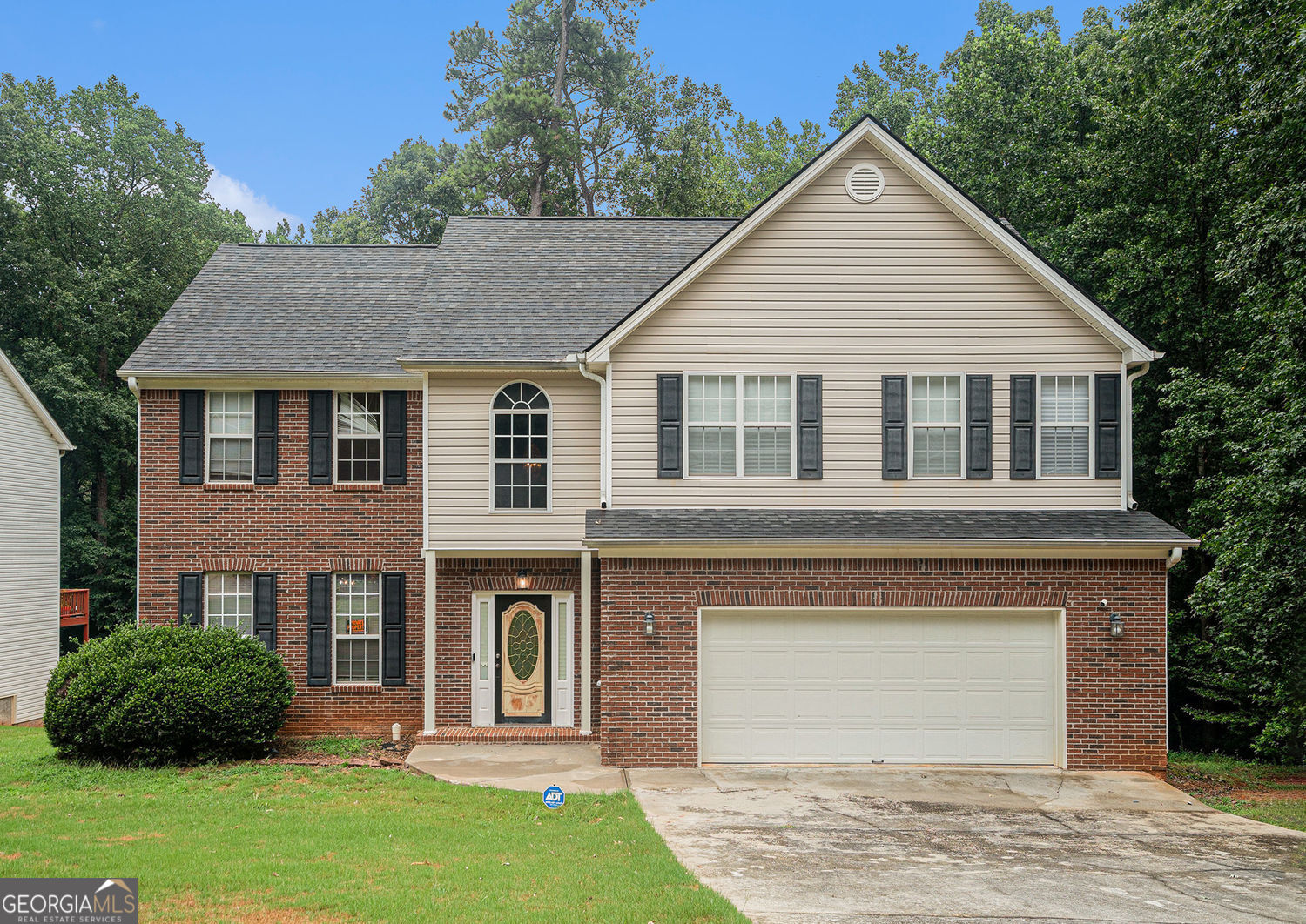 This lovely 2-story home features four bedrooms, 2.5 bathrooms, and a 2-car garage. The floor plan is a warm, inviting atmosphere you will love to call home. The home features a large living and dining room combo. The kitchen has an island for serving, and it is open to the family room. The spacious kitchen boasts a pantry and an open eating area for your culinary enjoyment! Private back deck for outdoor enjoyment and entertainment. The home also has a 2-story foyer. Upstairs: The primary suite features a sitting area with fireplace and an en-suite bathroom with dual sinks, a separate soaking tub & shower, and a walk-in closet. Three additional bedrooms offer ample space, with various closet options. With quick access to the interstate, you'll enjoy access to restaurants, shopping, and major roads. No HOA fees. Welcome home!