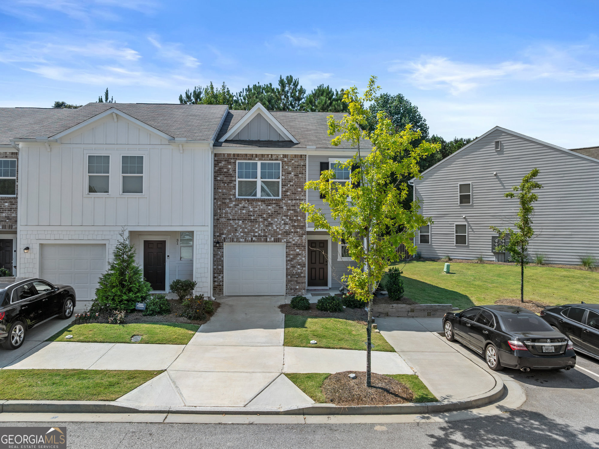 Desirable end unit in Rivington Walk subdivision! Come see this beauty for yourself today! Very clean and well maintained this home is move in ready, with upgrades to this already beautiful townhome, tiled backsplash and shiplap accent wall in the kitchen adding an elegant touch. The home offers 3 spacious bedrooms 2 and 1 half baths with a cute and private backyard you can enjoy your morning coffee. This end unit offers plenty of parking just off the side of the home and in a cul-de-sac to the left of the home you have lots of space for entertaining as well. Home is close to everything, Barrow Crossing shopping area, food, shopping and so much more! Urgent Care nearly, close to Highway 316, right in between Bethlehem, Winder and Monroe this area is booming!
