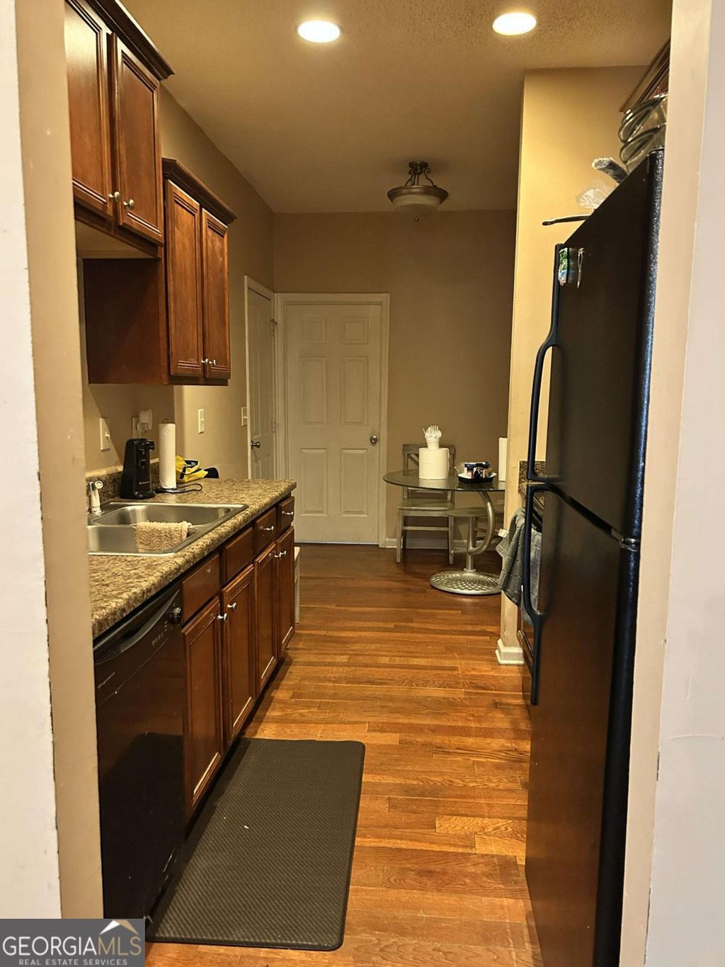 Photo of 6354 Olmadison Place, Atlanta, GA 30349 (MLS # 10679477)