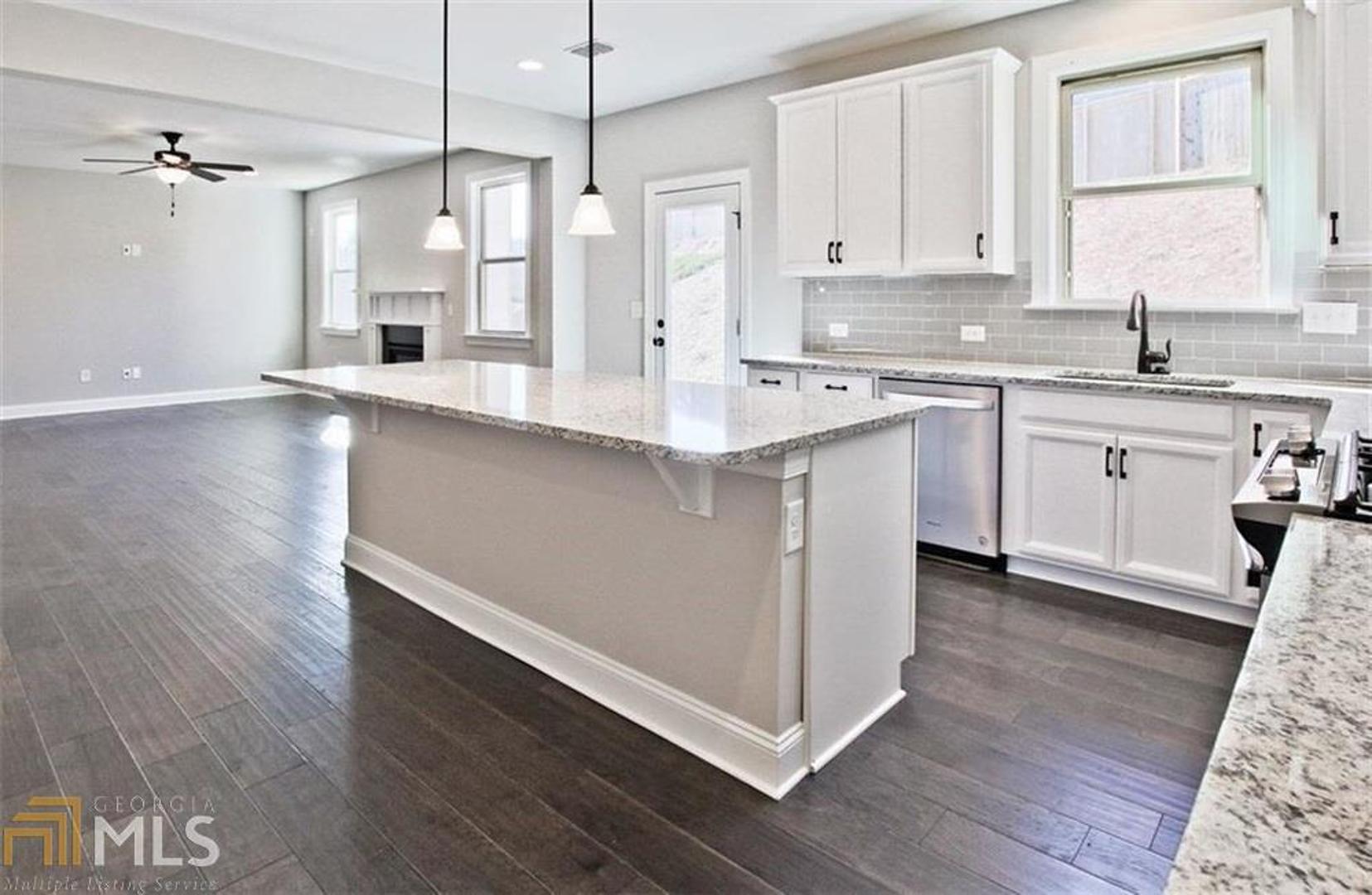 This home really is a MUST SEE. New home with full unfinished basement. Don't miss your last opportunity to get into this awesome community. Two story home with bedroom & full bath on main level. Formal living room w/coffer ceiling, formal dining w/eat in kitchen & lg island w/granite counter tops. Four bedrooms up including master. Loft area for media/games/family fun. Located in a cul-de-sac. Home has 9' ceilings both floors. Ceiling fans in all bedrooms, great room, loft. Laundry room has a sink. Many more upgrades throughout the house. Pictures are of another home of same floor plan.