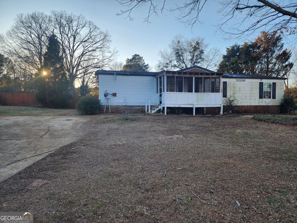 Photo of 865 Steele Drive, Hampton, GA 30228 (MLS # 10680116)