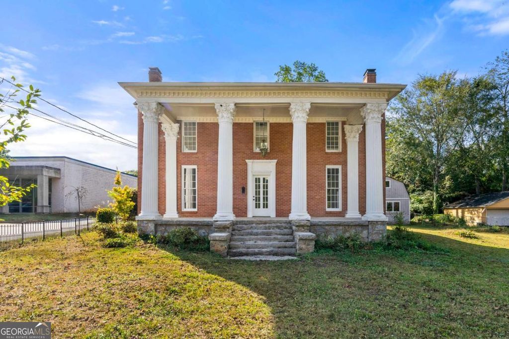 Photo of 3021 Stone Mountain Street, Lithonia, GA 30058 (MLS # 10658855)