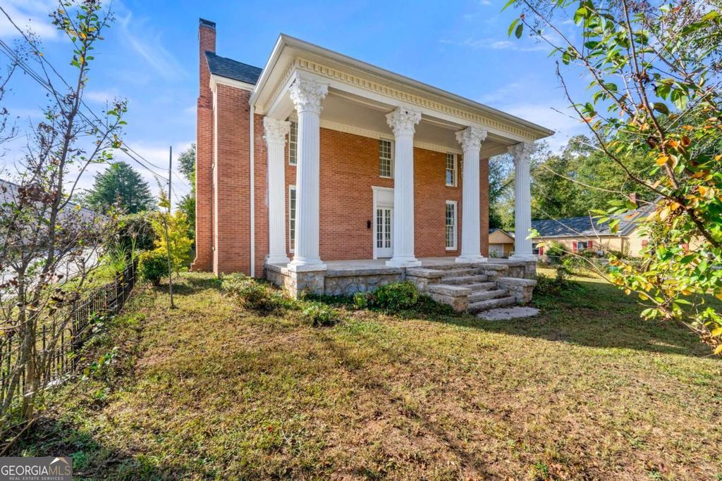 Photo of 3021 Stone Mountain Street, Lithonia, GA 30058 (MLS # 10658855)