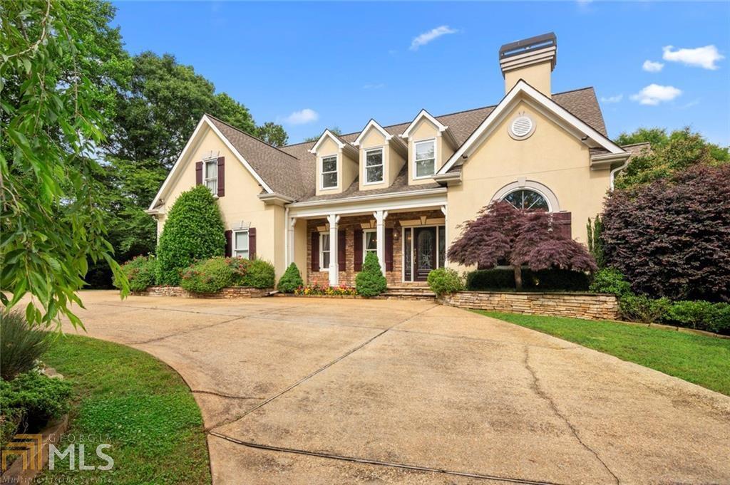 Enjoy the serenity of Perennial Grace Farm equestrian estate. This estate sits on 5.78 acres. This stunning home includes master on main w/renovated spa bath & custom walk-in closet,den w/fireplace, large great rm w/floor to ceiling windows overlooking private backyard. Open kitchen w/granite counters w/views to family rm & screened porch. Three spacious bedrooms on upper level with 2 full baths. Finished terrace level w/full bath. New carpet upstairs, new paint upstairs, new paint in the kitchen.