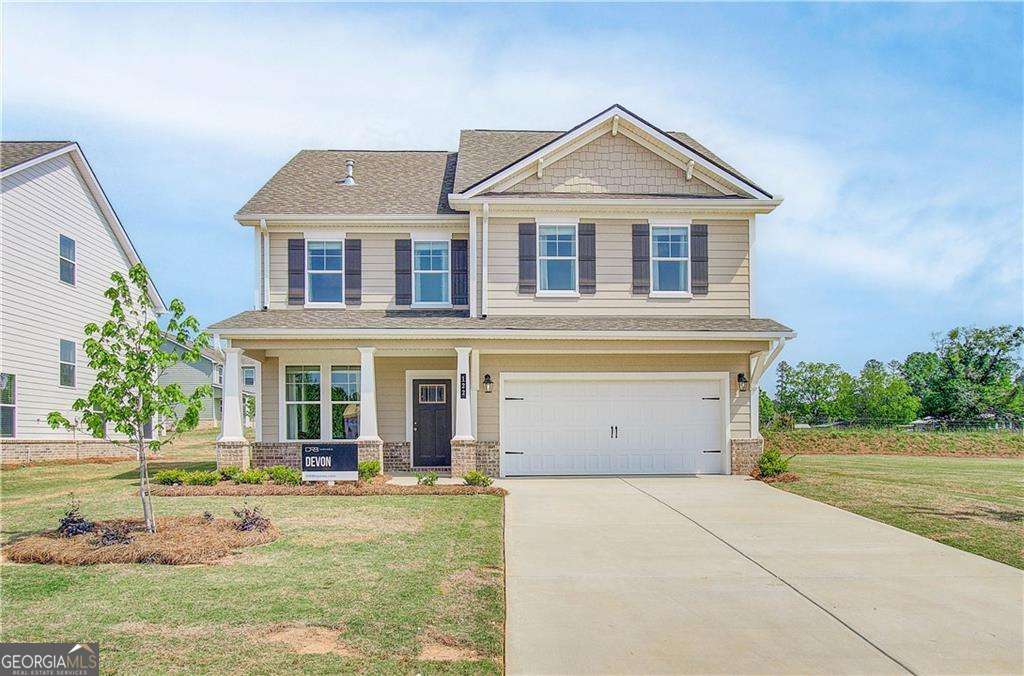 Introducing Homesite 40, the stunning Devon Plan within the luxurious Cooper Park Community of McDonough, GA. This remarkable 4 bedroom, 2.5 bath property features a spacious open concept kitchen, complete with a large island that overlooks the breakfast area and family room-perfect for entertaining and family gatherings. The stylish design includes quartz countertops, stainless steel appliances, and a chic backsplash that elevates the culinary experience. The generous primary suite serves as a luxurious retreat, boasting a walk-in closet and a private en suite bathroom featuring a dual vanity, a relaxing tub, and a walk-in shower adorned with elegant tile. Each bathroom in the home showcases solid surface countertops for both style and functionality. For added versatility, the home includes a bonus room on the third level, which can be transformed into a fifth bedroom or serve as a game room or home office, along with an additional full bath. Plus, the home features a basement, providing even more space for storage or future customization to suit your lifestyle. Located conveniently close to Interstate 75 and a wealth of shopping and dining options, this home is situated in the sought-after Dutchtown School District. The community amenities enhance your lifestyle, featuring a cabana, swimming pool, playground, dog park, and walking trails. *Stock Photo (not the actual house). Experience upscale living at its finest in this beautiful new plan! Please note: If the buyer is represented by a broker/agent, DRB REQUIRES the buyer's broker/agent to be present during the initial meeting with DRB's sales personnel to ensure proper representation.