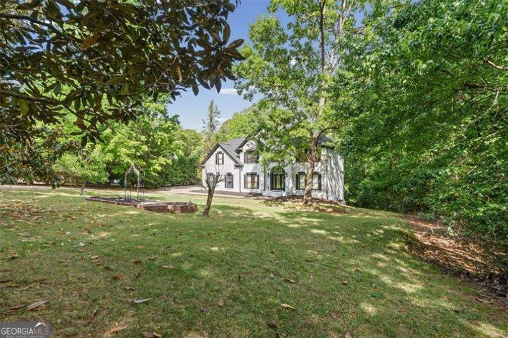 Photo of 663 Transart Parkway, Canton, GA 30114 (MLS # 10737937)