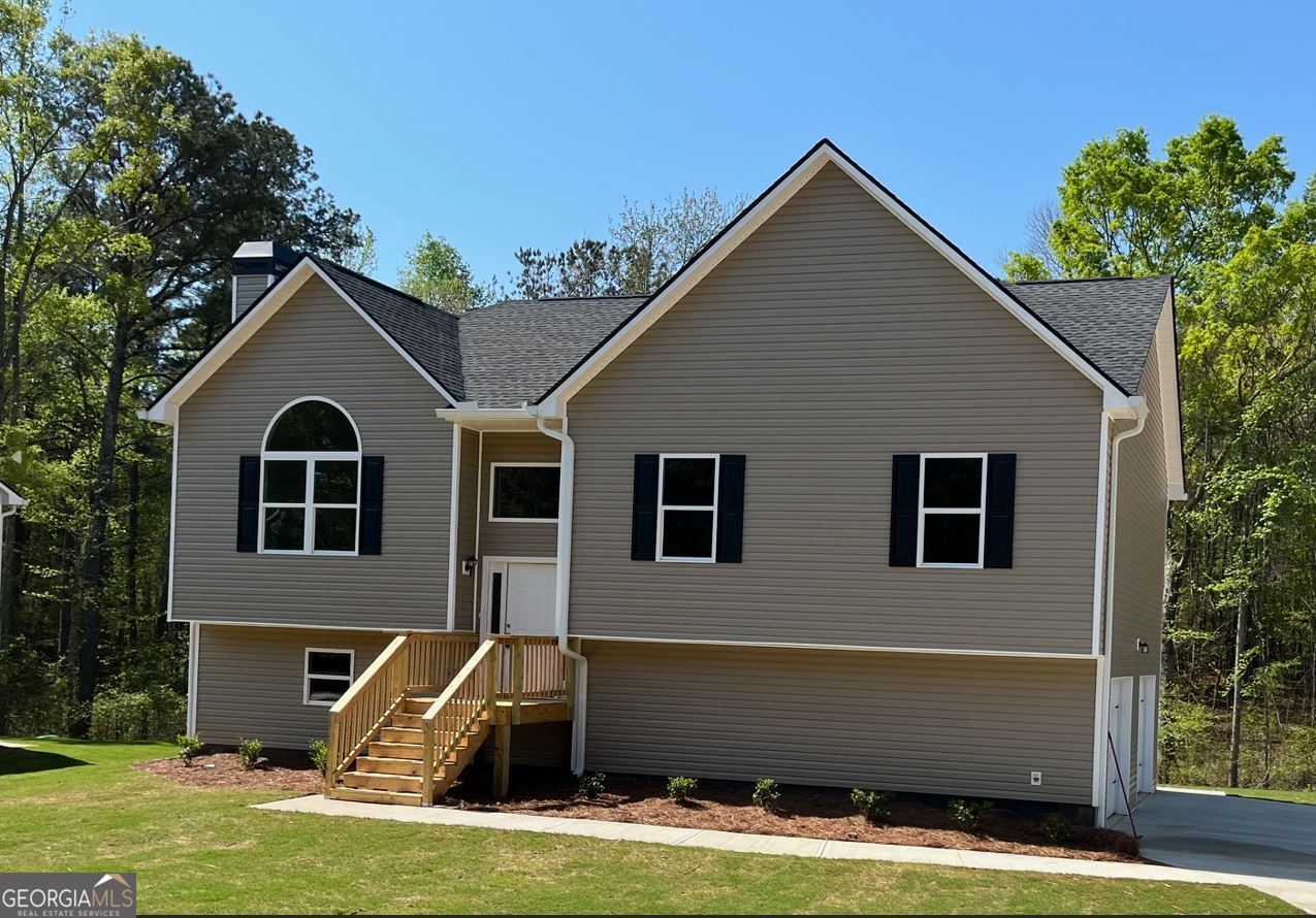 *** 100% FINANCING AVAILABLE ON THIS HOME*** New Construction Split Foyer available for immediate occupancy. This split foyer boasts over 2,000 SF of finished area. A huge double drive under garage leads you into a full finished BONUS ROOM with a full bathroom. Upstairs you'll find 3 bedrooms and 2 full bathrooms, all with 9 foot ceilings. Along with the vaulted great room with a fireplace, there is a dining room set up for your 12 seat dining table and hutch. The kitchen features vaulted ceilings, solid countertops, all stainless appliances, soft close-stained cabinets and a pantry for your storage needs. The master bedroom features a trey ceiling with a ceiling fan and the master bath includes solid counter tops and both a garden tub and a separate shower unit. All these features are available along with a huge rear deck and a sodded front and side yards. No HOA fees to worry about. The home is APPROVED FOR A USDA HOME LOAN, and we have a 100% FINANCING PACKAGE AVAILABLE with NO PRIVATE MORTGAGE INSURANCE (PMI), PROVIDED BY UNITED COMMUNITY MORTGAGE . Make plans to come and see this beautiful home for yourself!