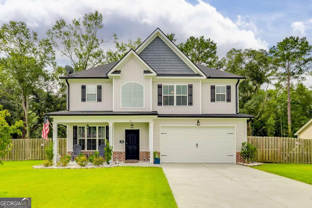 Welcome to 92 Oakmont Drive in the desirable Mossy Hollow subdivision of Guyton! This energy efficient 4 bedroom, 2.5 bath home features luxury vinyl plank flooring downstairs with carpet in bedrooms and tile in the baths and laundry room. The kitchen shines with granite countertops, a practical island, pantry, and ALL appliances included. Washer, dryer, garage fridge, and garage freezer also remain-bonus value! Enjoy a conveniently located laundry room and extra floored attic space for storage. The master suite offers granite vanity top with double sinks and comfort. Step outside to a private backyard oasis with wooded views, a 27' above-ground pool, extended patio, and covered grilling area. A privacy fence and split-rail fence complete the outdoor space. Located in a quiet, community with easy access to Pooler, Savannah, and Effingham County schools. This move-in ready home is a must-see!