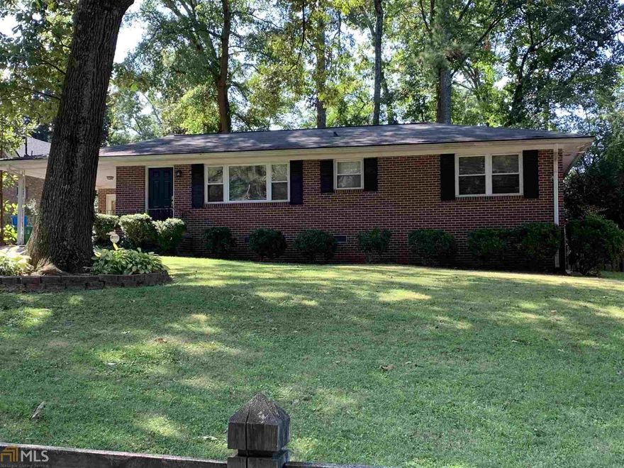 One level living in this beautiful Ranch home with original hardwood floors in ALL rooms. Open Dining room space large enough for a huge farm table. Spacious living room large enough for a wrap around sofa with a separate reading/eating area. Kitchen has updated appliances and granite counters, lots of cabinet space. Laundry conveniently located on main floor.  Heavy sliders to your private flat peaceful backyard with a patio. Great curb appeal with huge trees Newer HVAC and newer Water Heater.