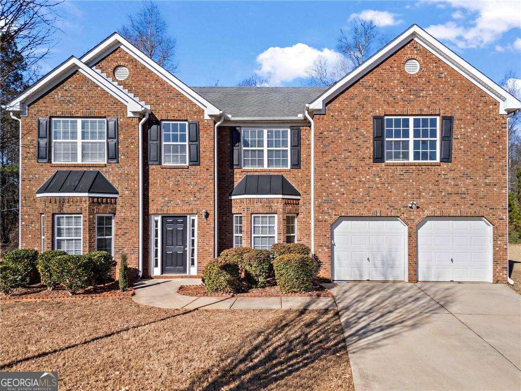 Stunning 5-Bedroom Home with Over 4,000 Sq. Ft. in Prime Location! Welcome to this beautifully updated 5-bedroom, 4-bath, two-story home nestled in a quiet cul-de-sac! Featuring a charming brick front and built on a slab, this home offers modern comforts with timeless appeal. Step inside to discover fresh paint throughout, new luxury vinyl plank (LVP) flooring on the main floor, and plush new carpet upstairs. The main level boasts a spacious bedroom and a full bath, perfect for guests or a home office, along with a cozy family room complete with a fireplace. Adjacent to the kitchen, you'll find a versatile keeping room, ideal for casual lounging or additional dining space. Upstairs, the oversized master suite impresses with a large sitting area, creating a true retreat with bathroom featuring seperate tub and shower and an oversized closet space. The second floor also features a loft area, perfect for a playroom, home gym, or office space and 3 additional spacious bedrooms and 2 full baths. With over 4,000 square feet of living space, there's room for everyone! The community amenities, including swim and tennis facilities, add to the allure. Located just minutes from Hartsfield-Jackson International Airport, this home combines convenience and lifestyle in one package. Don't miss this opportunity-schedule your showing today and make this house your home!