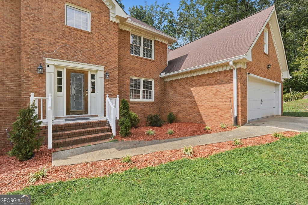 Photo of 835 Lockriver Way, Lawrenceville, GA 30044 (MLS # 10847462)