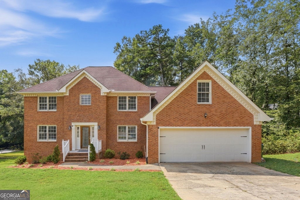 Photo of 835 Lockriver Way, Lawrenceville, GA 30044 (MLS # 10847462)