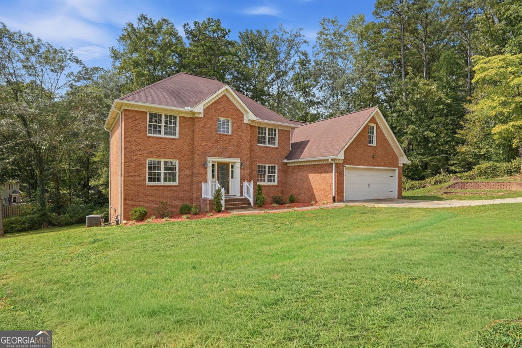 Photo of 835 Lockriver Way, Lawrenceville, GA 30044 (MLS # 10847462)
