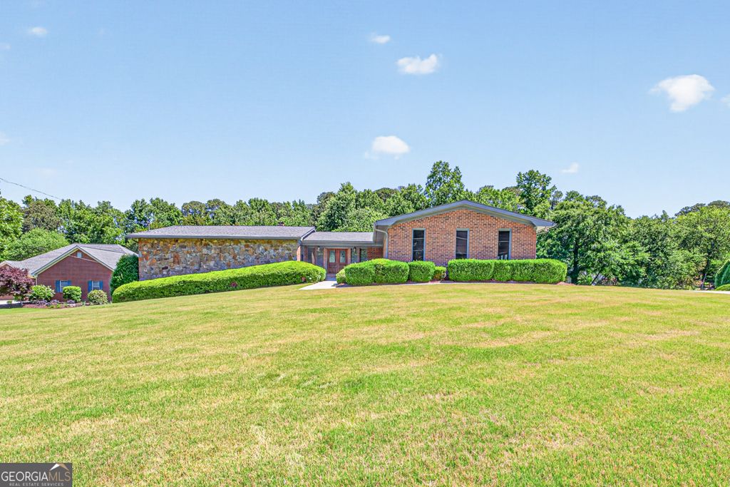 Photo of 1728 Rivermist Drive SW, Lilburn, GA 30047 (MLS # 10768621)
