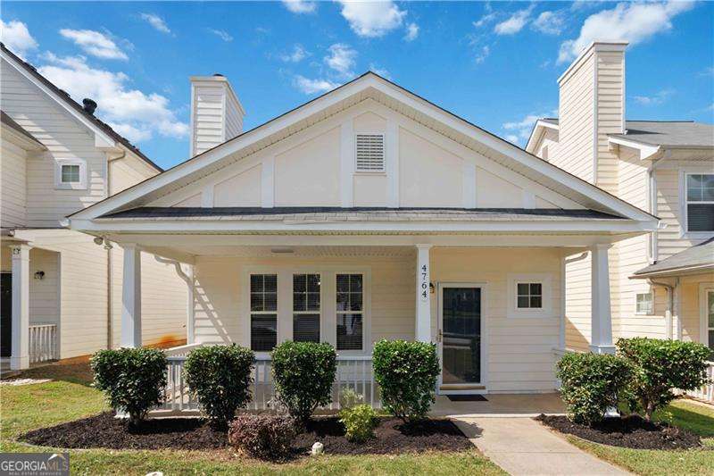 Beautifully Renovated 3-Bedroom, 2.5-Bath Home in a Prime Location! Welcome to this stunning and move-in ready home featuring 3 spacious bedrooms and 2.5 bathrooms. Step inside to a bright and airy 2-story great room with gleaming hardwood floors throughout and a cozy fireplace-perfect for gatherings. The updated kitchen showcases white cabinets, stylish tile backsplash, quartz countertops, a pantry, breakfast bar, and an eat-in dining area. Conveniently located off the kitchen is the laundry room and a half bath for guests. Additional main-level highlights include a closet, under-stair storage, and access to the fully finished, rear-entry garage. Enjoy outdoor living with covered front and back porches, ideal for relaxing or entertaining. Upstairs, the owner's suite offers a spacious walk-in closet with custom shelving, double vanities, a soaking tub, and a separate shower. The second level also features two secondary bedrooms and a full bathroom with a tub/shower combo. Located in a vibrant community with fantastic amenities including a pool, playground, and clubhouse for events. Conveniently situated near shopping, dining, schools, and major highways. Just minutes from Camp Creek Marketplace and only 10 minutes from Hartsfield-Jackson Atlanta International Airport. Don't miss the opportunity to own this beautifully updated home in a sought-after location. The location of this property is eligible for 100% financing. Payment assistance program available for 1st time homebuyers.