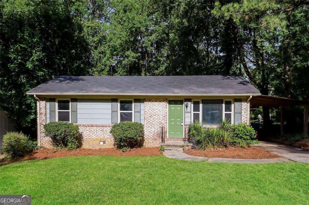 This cute 3-bedroom 2-bath ranch features hardwood floors throughout the living room and dining area. The 4-side brick home includes an updated kitchen with appliances and a breakfast area. The exterior features a carport with a side entrance to the kitchen and a nice backyard for outdoor enjoyment. Come make this yours!