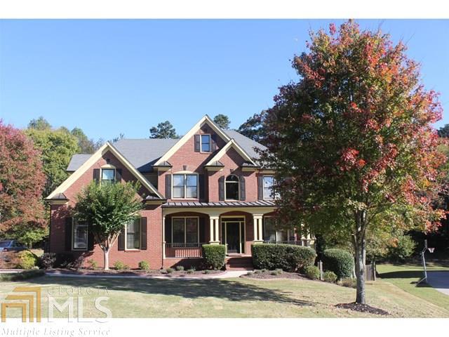Lambert HS district with Finished Basement - Workshop is like a 3rd Car garage (MUST SEE) Immaculate home w/ extensive hardwoods on main (just refinished & beautiful) Gourmet Kitchen w/ Granite C/Tops, tiled backsplash, 2 Fisher & Paykel Dish Drawers, open view to 2 story family room- lots of natural light-huge screened in porch overlooking large,private,fenced backyard (freshly stained).2 car side entry garage plus the workroom under porch (size of 3rd car garage). You will love it. 2 laundry rooms. Master suite w/ double trey ceiling, ceiling fan, frame less shower,tiled shower and floor w/ Granite Counter tops - (updated beautifully) nursery upstairs the size of a bedroom(just no closet). Finished Basement w/ Media room stubbed for 2nd kitchen full bath