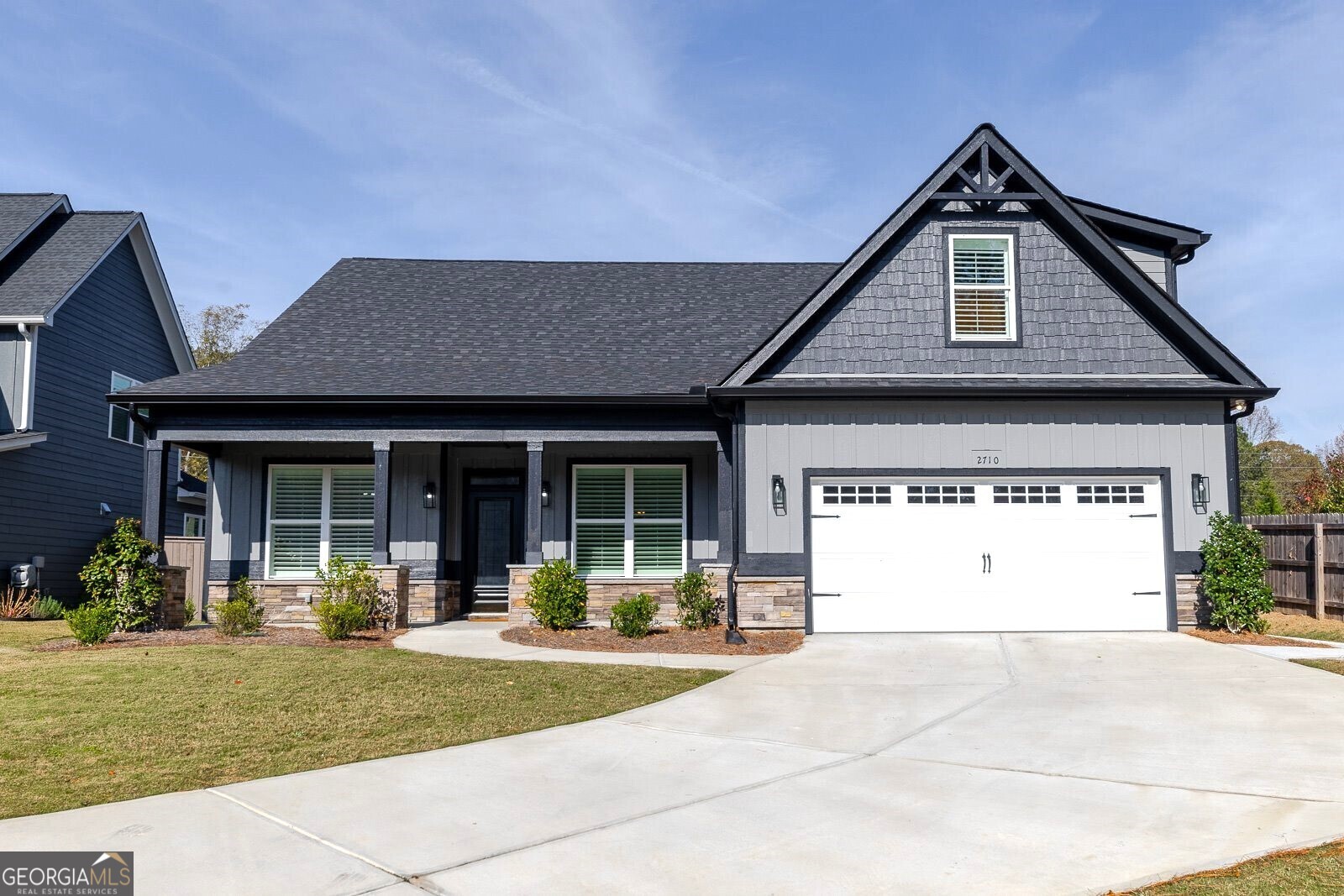 Welcome Home! This designer Showplace Model Home is Meticulous & staged for immediate Move in! FURNITURE NEGOTIABLE (NEW). Location - Location and BETTER THAN NEW (2023) -this vibrant 55+ adult community is nestled in the heart of Marietta, only minutes to the Square/Kennesaw Mountain Park & trails. This captivating Ranch home (The Hampton floorplan) is located on the PRIME LOT in this 25-home community offering the BEST privacy with ample guest parking too. What an entertainer's dream home with Soaring ceilings, beamed ceiling in the family room, an inviting open floorplan, delightful sunroom with a custom Marble floor, and expansive newly added patio creating a private setting to entertain your guests. 3 bedrooms on the main level (incl. the primary suite), plus a 4th bedroom, Bath, and an unbelievably spacious loft/flex space (perfect future theatre/media room) all upstairs. So Many upgrades - WOW. Plantation Shutters throughout, barn door access to Laundry/mud/pantry room, formal dining with coffered ceiling, split bedroom plan, the list keeps going! Lawn Maintenance/trash included in the HOA. This home offers the luxury, comfort, and convenience you desire. Come see and Fall in Love today!
