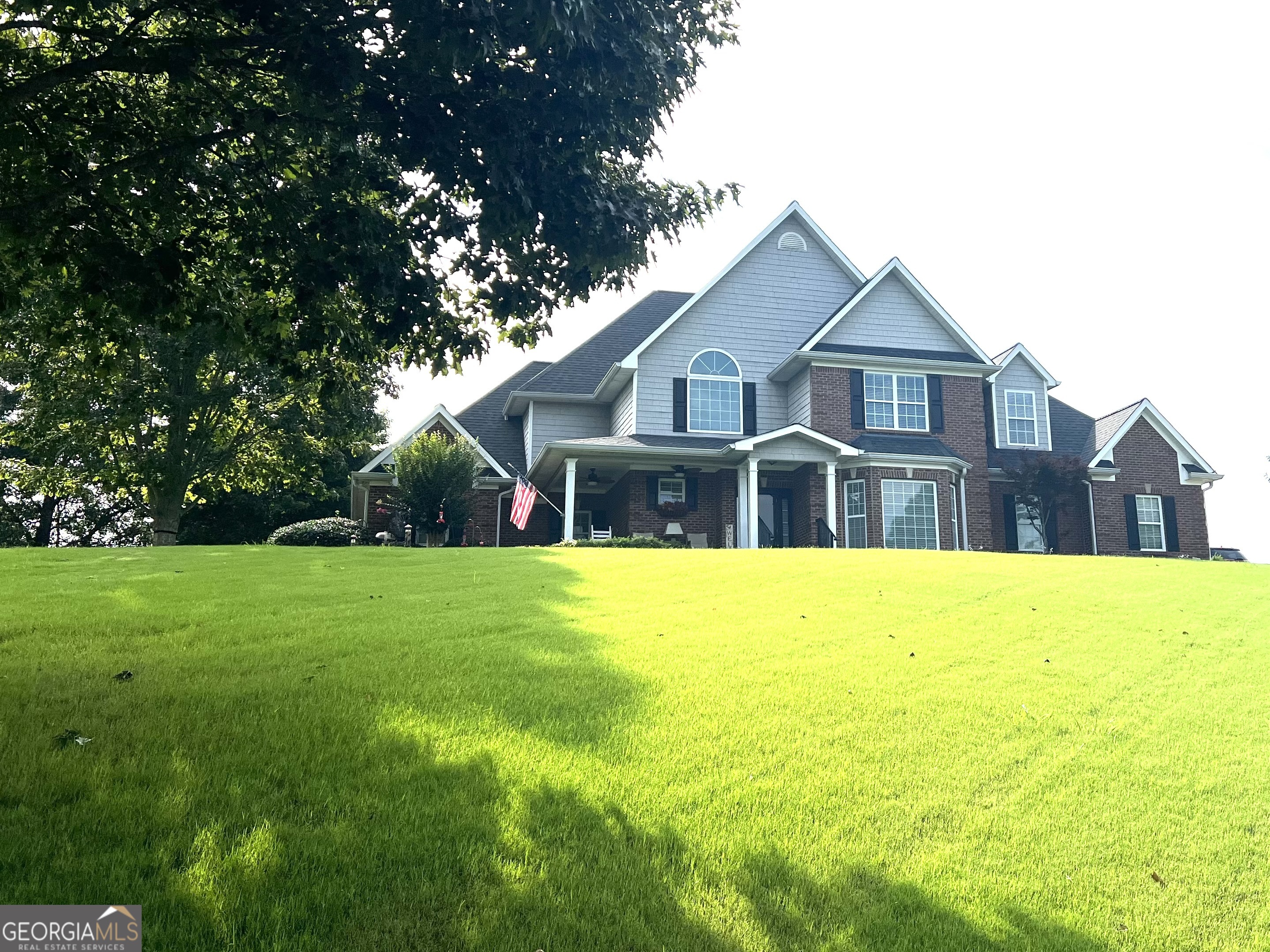 Beautiful timeless home. Welcome to perfection! Master suite on main level and additional master on opposite side of home. 2 additional bedrooms ,bonus room and full bath upstairs. Formal dining room and breakfast room and gorgeous custom kitchen. Recently added hardwoods upstairs, deck, retractable awning, dishwasher, microwave, countertops, custom shower and roof. Double den doors lead to cozy den/sunroom. Enjoy evenings on deck or under beautiful pergola or even better the beautiful patio. Front porch sitting is also an experience. Beautiful mountain views from rockers or front porch swing. Community pool and clubhouse.