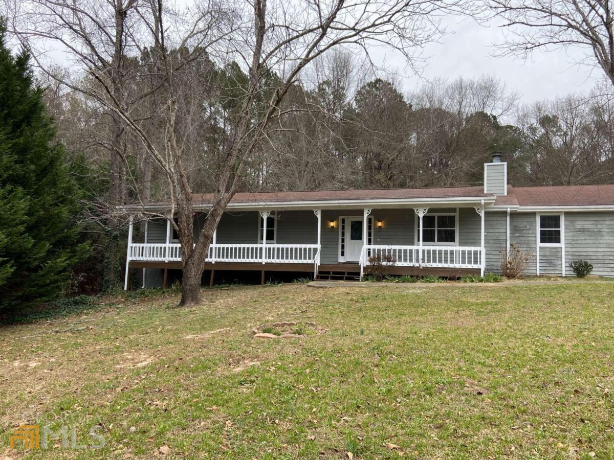 Ranch home with 4 bedrooms and 2 bathrooms. New carpet and fresh paint. Spacious front porch and rear ramp for wheelchair access. Main bathroom is handicap accessible. Home is in a cul-de-sac and on level .91 acres. Plenty of room for RV parking. USDA address eligibility confirmed.