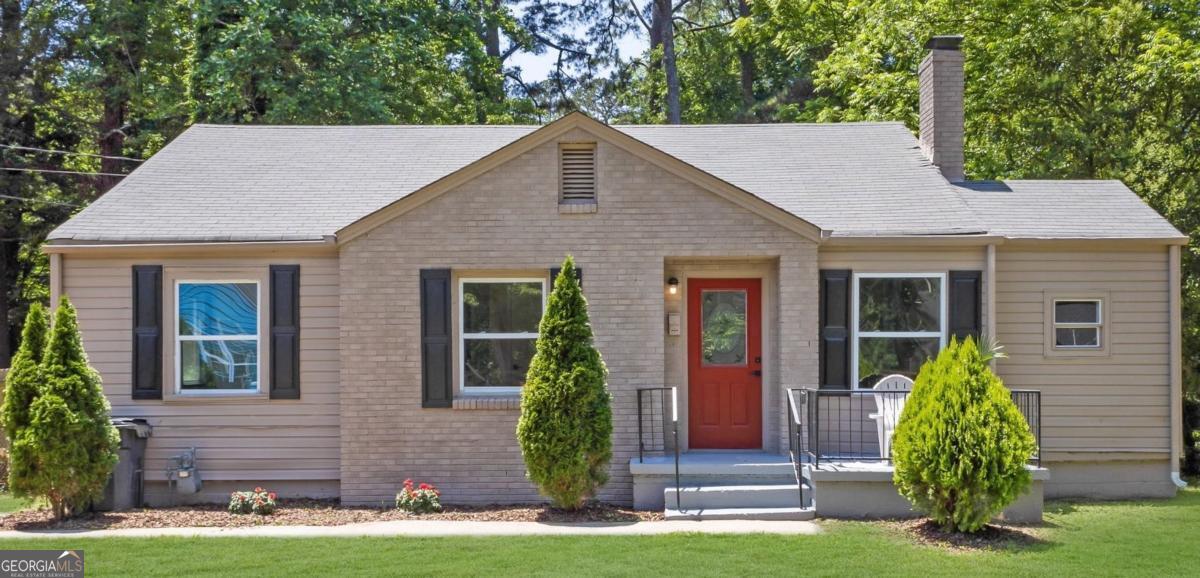 Charming, updated home in a prime East Point location. This recently renovated 3 bedroom, 1 1/2 bathroom ranch home offers modern comfort and classic character in an established neighborhood. Step into the bright family room that features a brick fireplace. Adjacent to the family room is a dining room that opens to the kitchen. This layout is perfectly suited for entertaining guests. The home's unique style offers beautiful hardwood floors throughout, stainless steel appliances and updated fixtures. The home features a large half bathroom in the front of the home for your guests, and three spacious bedrooms and a private full bath in the back of the home. The backyard stretches deep into the private lot, providing opportunities for outdoor living or a nice shed. Your new home has proximity to quality school. restaurants and shopping. It's just minutes away from the highway, and conveniently located to Hartsfield Airport and downtown Atlanta. Don't miss out on this beautiful, renovated home with style and affordability!