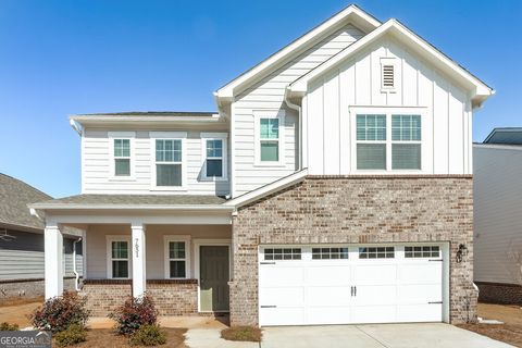Photo of 7651 Saffron Avenue, Covington, GA 30014 (MLS # 10697392)