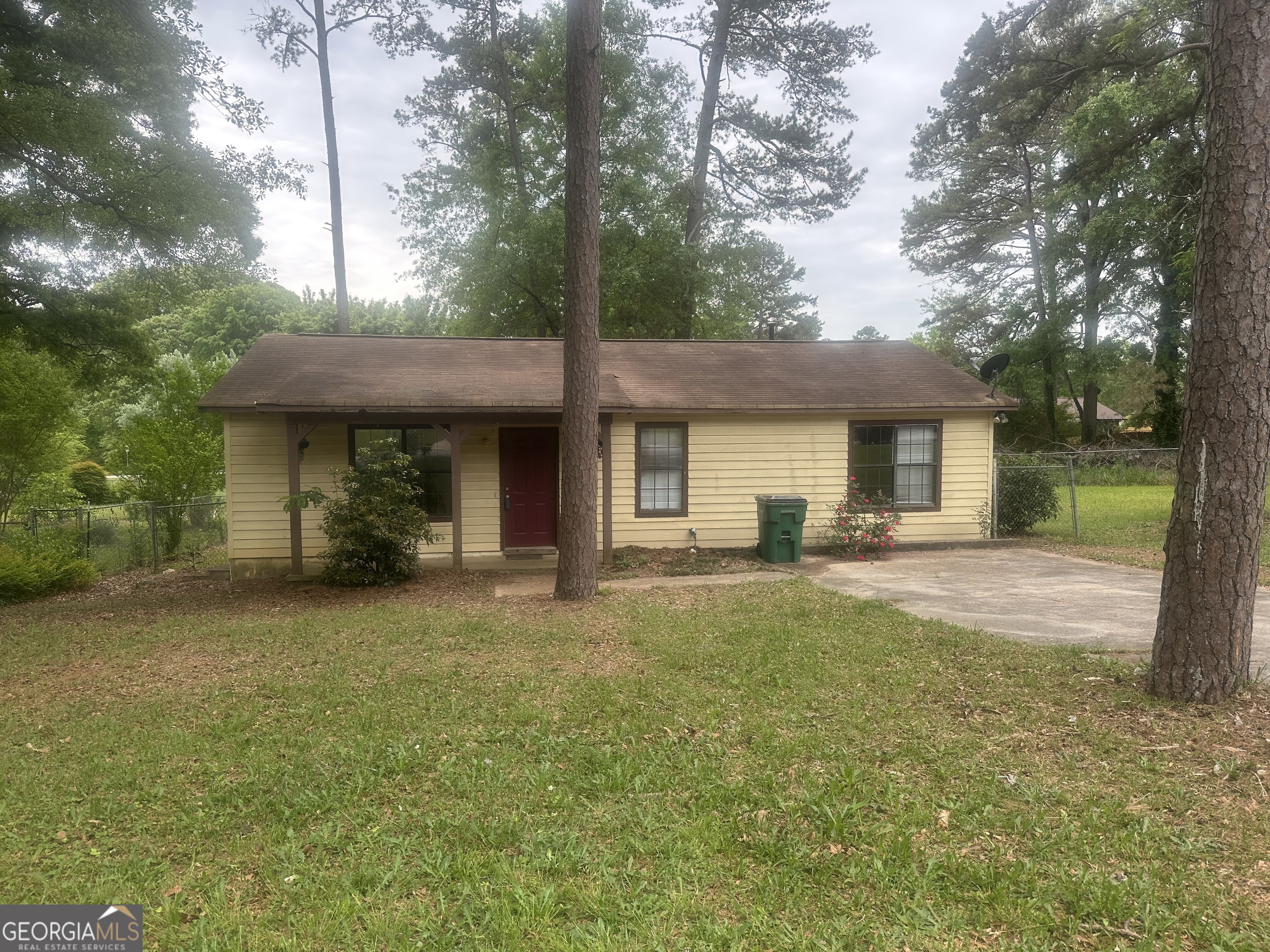 Great location. Close to shopping and dining. Great starter home or investment property. 3 bedrooms/2 full baths. Large family room and living room. Covered back porch overlooking large, level backyard. A few improvements and you can make it your own. Sold As-Is. No blind offers. Ask how you can receive up to $500 credit by using one of our preferred lenders. Exclusions may apply.