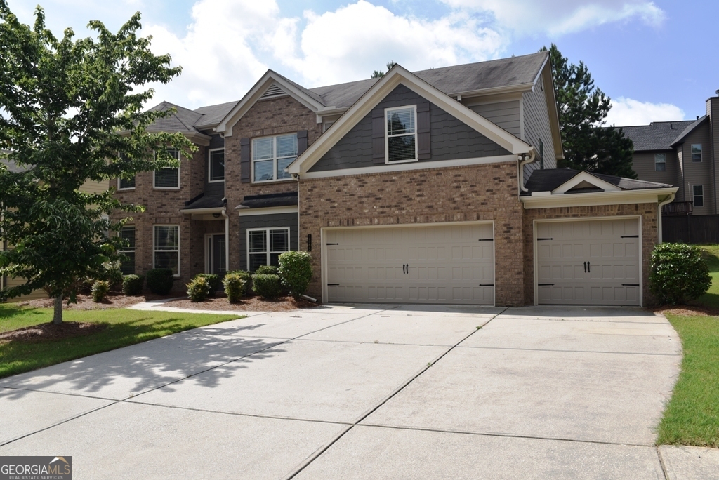 Beautiful 2 story home in one of the areas finest swim/tennis subdivisions! The home has been refreshly painted, new carpets with new appliances. A few of the outstanding features include a grand two story foyer, large kitchen including breakfast bar island, stainless steel appliances and granite counters, formal dining and living rooms, hardwood floors, gas fireplace, guest suite on main, oversized master en-suite with huge walk-in closet on second floor, second floor large media room and laundry, vaulted ceilings with crown molding throughout the home, 3 car garage, level first floor that is completely accessible, and so much more! Enjoy a walk through the quiet neighborhood, a dip in the pool, an afternoon tennis match. Brand new Publix, Starbucks, restaurants, and shopping center just down the street.