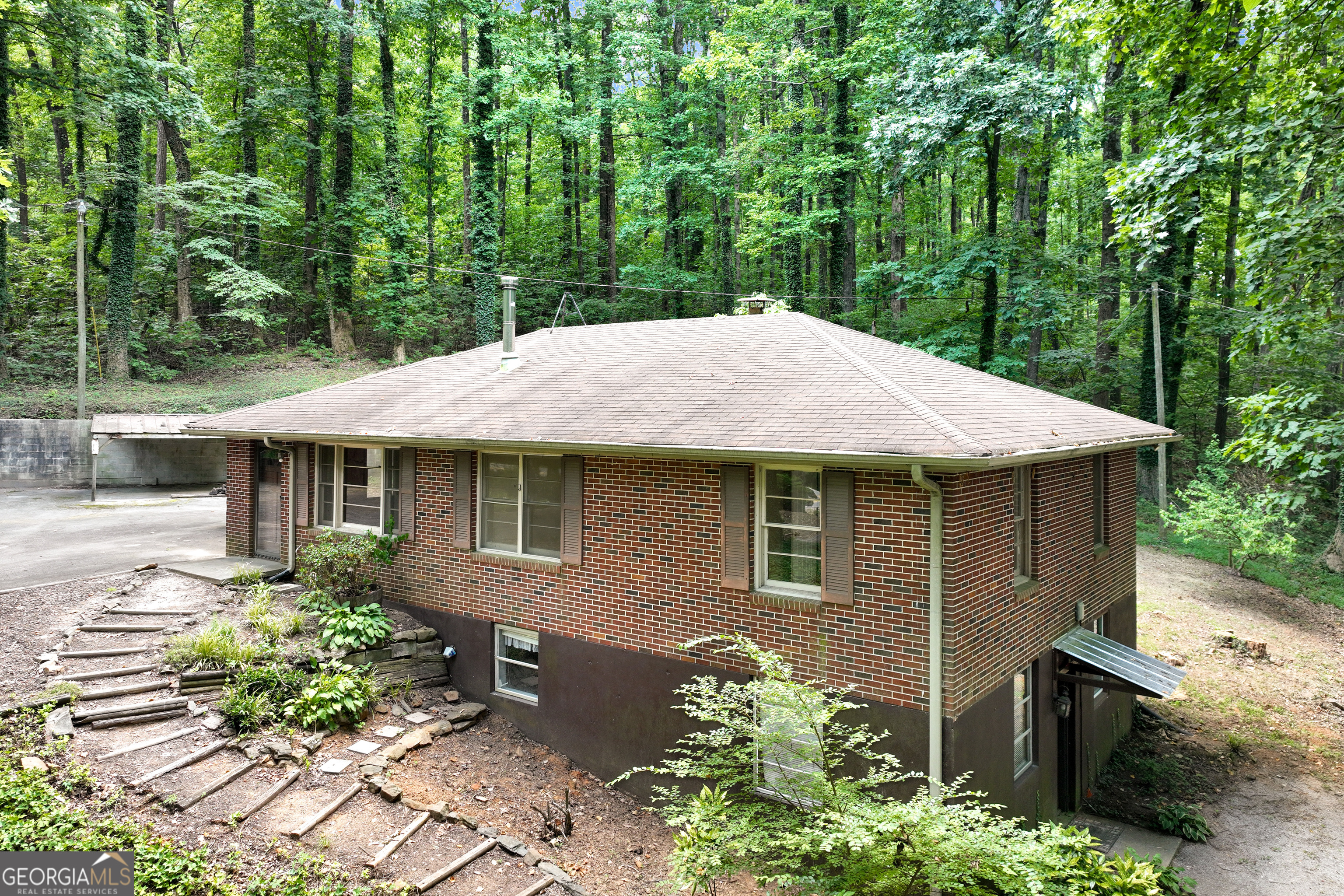 Tucked Away Treasure This private 3-bedroom, 2-bath home offers SPACE to GROW, with three additional rooms in the basement-perfect to finish a guest space, home office, or hobby rooms. The layout is both FUNCTIONAL and FLEXIBLE, designed for COMFORTABLE living. Step outside to ENJOY your own slice of CHARM with a shed, EXPANSIVE parking and barn...ideal for a workshop, STORAGE, or that dreamy CREATIVE studio you've always wanted. The POSSABILITIES here are endless! Whether you're looking for PRIVACY or SPACE to CREATE and EXPAND, this property is for you!