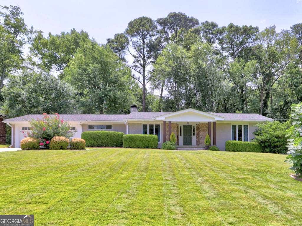 Photo of 715 Glenforest Road, Sandy Springs, GA 30328 (MLS # 10814735)