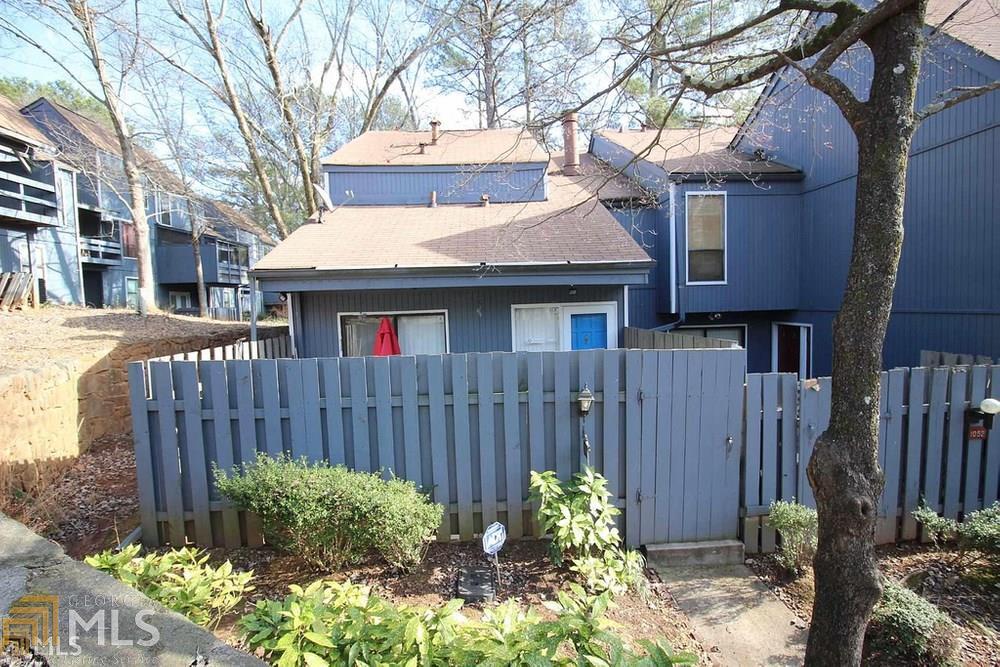 First Time Buyers tired of paying rent for a home that will never be yours? Then welcome home. Enjoy this very large townhouse with hardwood flooring thru out the main level. Enjoy this corner lot with privacy fence. You want believe the space for the amount of money. Close to shopping, schools and stone mountain park.