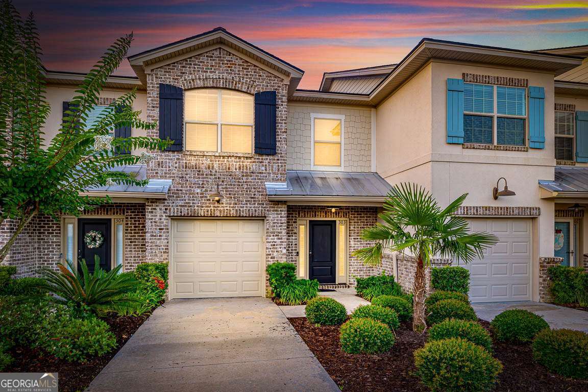 Welcome to 303 Mariners Circle, a stylishly furnished townhome nestled in the heart of Mariners Landing on St. Simons Island. Just minutes away from the beach, marina, bike trails, and shopping, this 3-bedroom, 21/2-bath residence delivers coastal living at its finest. From the gleaming kitchen to the serene private yard and screened porch, this home combines comfort and coastal charm. Perfect as a vacation retreat, rental investment, or year-round residence, 303 Mariners Circle offers island living with none of the hassle-fully furnished and turnkey. A short drive to charming Frederica Road, the St. Simons Lighthouse and Pier, Neptune Park, restaurants, and boutiques and minutes from East Beach, marina access, and miles of scenic bike and walking trails. Schedule your private showing today and step into life on St. Simons Island at this beautifully appointed townhome. Property Highlights -3 Bedrooms (all upstairs), 2.5 Baths in approx. 1,740 sq ft of well-designed living space -Built in 2016, this home has been lovingly maintained by its original owner, complete with fresh paint and pristine finishes -Spacious living and dining area with open flow to the kitchen -Gourmet kitchen featuring stainless-steel appliances, granite countertops, under-cabinet lighting, breakfast bar, & pantry -Primary suite includes tray ceilings, dual vanities with granite, a roomy shower, and two walk-in closets for ample storage