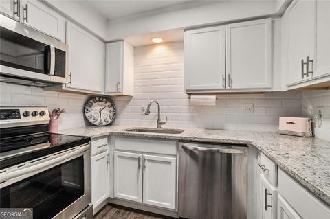 Photo of 94 Rosaire Place NW, Atlanta, GA 30327 (MLS # 10676326)