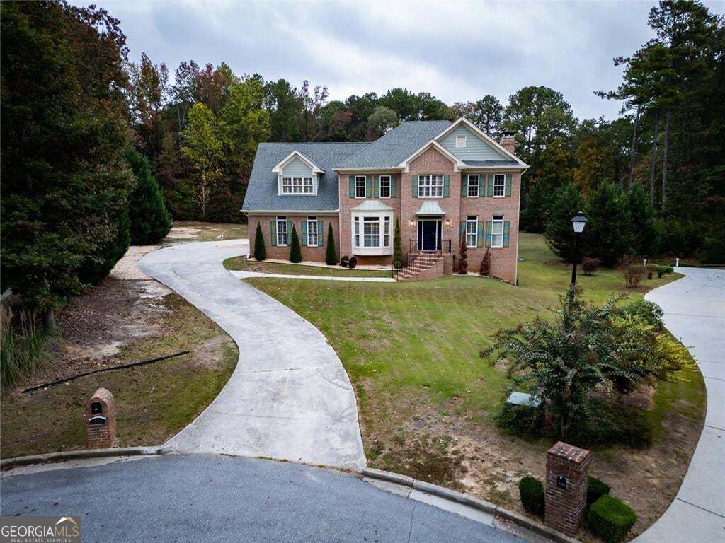 Photo of 1710 Winding Creek Cir, Snellville, GA 30078 (MLS # 10878604)