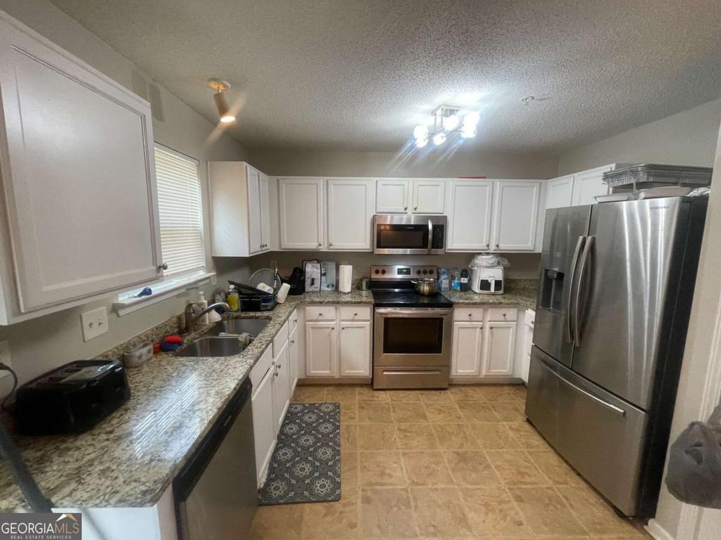Photo of 1763 Old Dogwood, Jonesboro, GA 30238 (MLS # 10754634)
