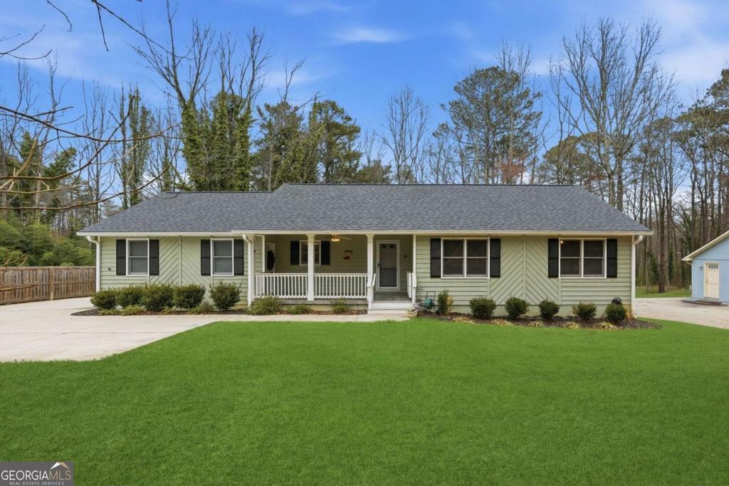Photo of 1066 Oak Road SW, Lilburn, GA 30047 (MLS # 10713858)