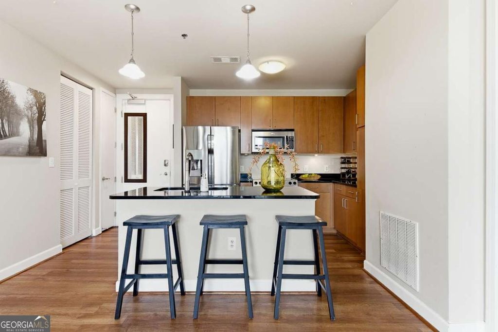 Photo of 711 Cosmopolitan Drive NE #517, Atlanta, GA 30324 (MLS # 10693452)