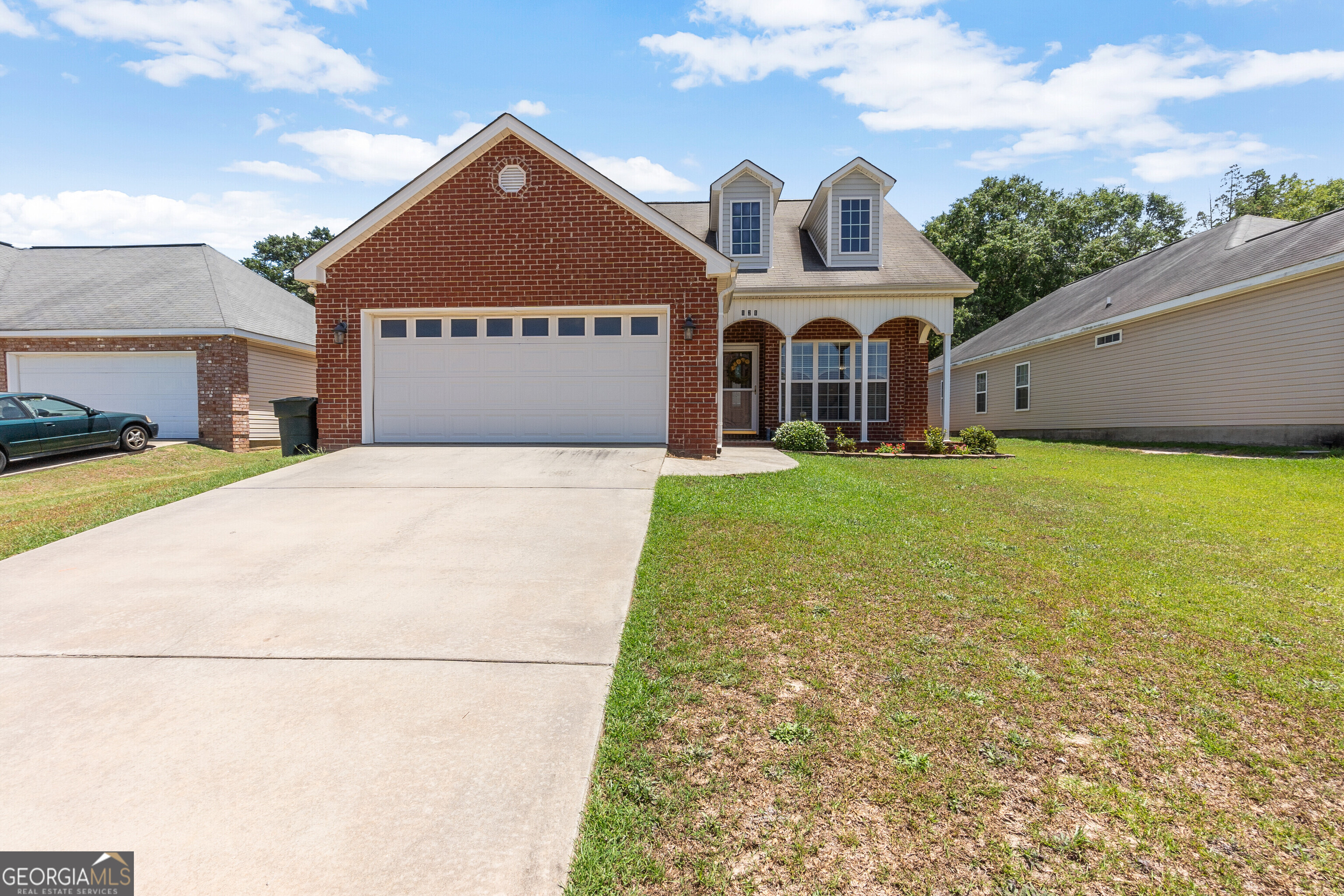 Are you looking for a decently priced home in Houston County? Come see this beautiful home; perfect for families, empty nesters, or anyone looking for a place to call their own! Located on a gentle hill, this brick front home feels so welcoming and is in the heart of Warner Robins with no city taxes. Owners have updated fixtures and painted recently. The LVP floors in common areas make upkeep a breeze. The primary suite is large enough to accomodate a small sitting area and the bathroom features 2 closets with built in shelving, and a separate soaker tub. There are two other bedrooms as well for guests or family. The laundry room has plenty of room and opens into the 2 car garage to double as a mud room. The back door opens onto a covered porch with fan and there is an open patio beyond to the back yard with privacy fencing, perfect for grilling out or just listening to the sounds of nature. Come see this lovely home for yourself. You won't want to leave!