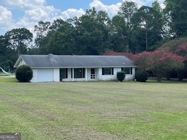 Great brick house in the country. This home features 3 bedrooms, 3 full baths with possible 4th bedroom master suite or bonus room. Home also features large open family room and kitchen combo with laminate wood flooring through out. Home has had some updates.