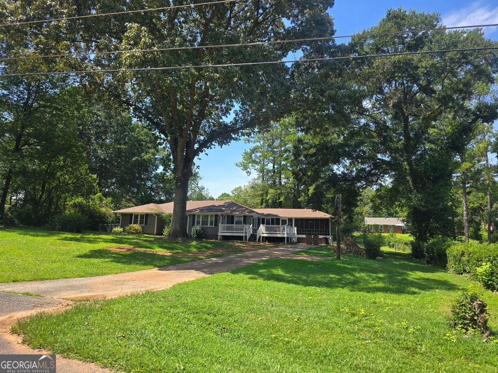 Photo of 7379 Dexter Drive, Riverdale, GA 30296 (MLS # 10841825)