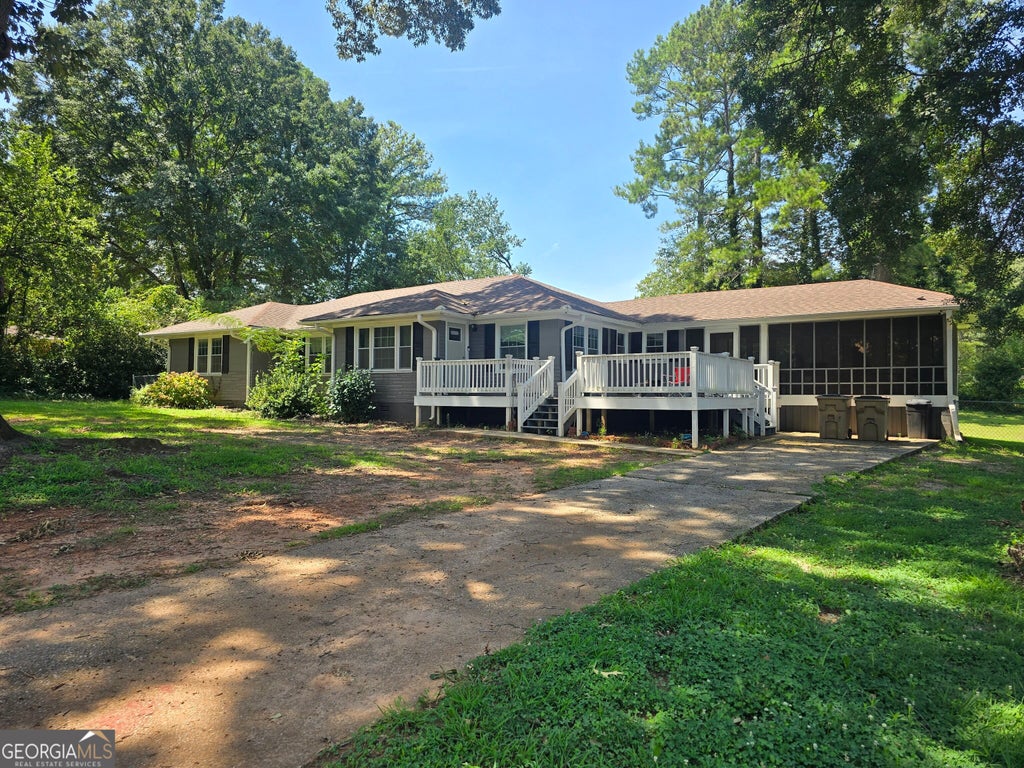 Photo of 7379 Dexter Drive, Riverdale, GA 30296 (MLS # 10841825)