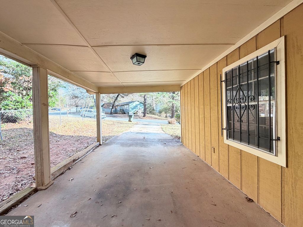 Photo of 7118 Pineneedle Drive SW, Covington, GA 30014 (MLS # 10655211)