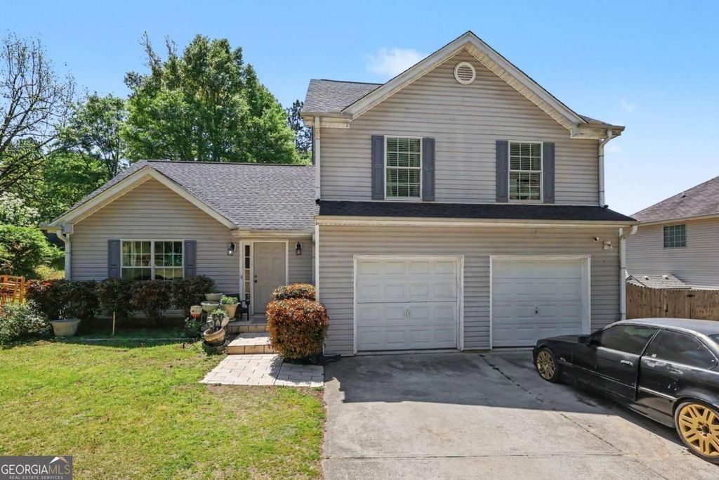 Photo of 7627 Pleasant Hill Road, Lithonia, GA 30058 (MLS # 10731629)